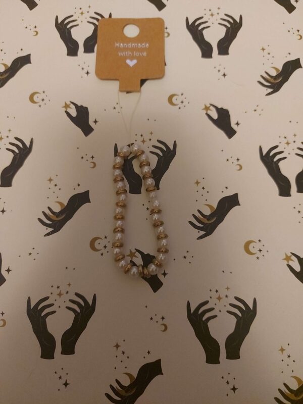 Gold phone charm
